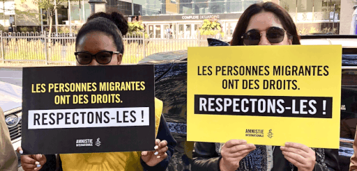 Manifestantes : Les personnes migrantes ont des droits. Respectons-les